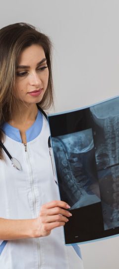 young-doctor-looking-radiography_23-2148396720